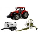 Traktor koos haagise, reha ja punase tankeriga