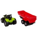 Roheline traktor koos haagisega