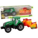 Roheline traktor oranži kultivaatoriga lastele