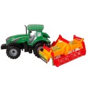 Roheline traktor oranži kultivaatoriga lastele