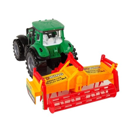 Roheline traktor oranži kultivaatoriga lastele