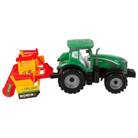 Roheline traktor oranži kultivaatoriga lastele