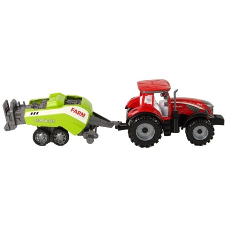 Punane põllutraktor rohelise külviku hõõrdeajamiga