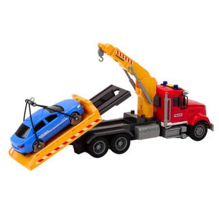 Kraanaga puksiirauto, mille tuled põlevad