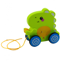 Beebi dinosauruse tõmbemänguasi kõlab kõrisevalt roheliselt