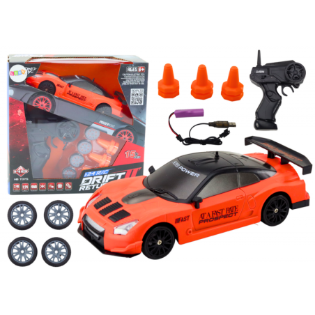 Kaugjuhitav R/C sportauto 1:24 oranžid vahetatavad rattad