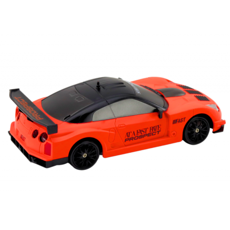 Kaugjuhitav R/C sportauto 1:24 oranžid vahetatavad rattad