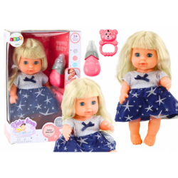 Nukk tumesinise kleidiga Pissiv ja pudeliga