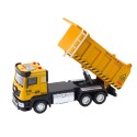 Kollane kallurauto tõstetava kaubakasti ja heliefektidega
