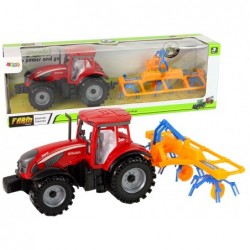 Punane reha hõõrdeajamiga traktor