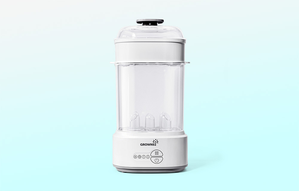 Empty bottle sterilizer placed on a bright studio background