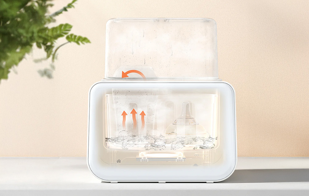 A warmer with a visualization of steam rising during operation, showing the warming and sterilization function