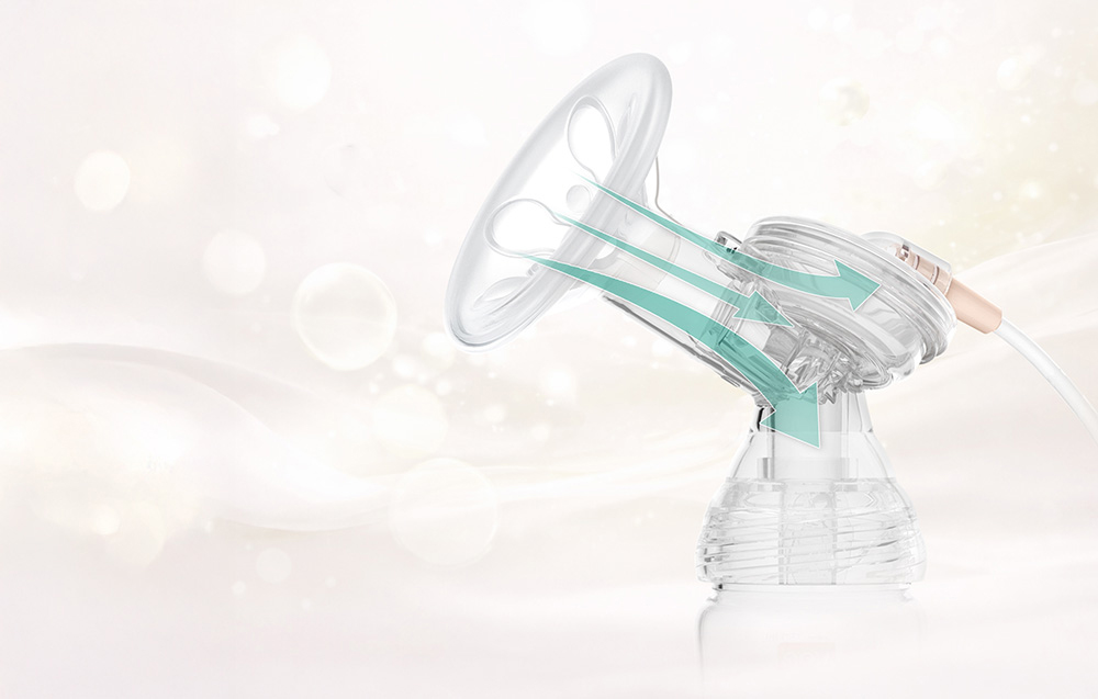 Close-up of the upper part of the breast pump with the direction of air flow marked with arrows