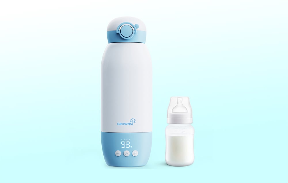 A portable bottle warmer placed next to a full bottle on a light background