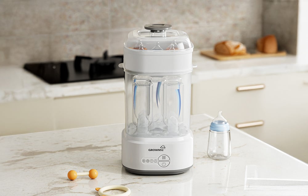 Bottle sterilizer with four bottles inside, placed on a kitchen counter