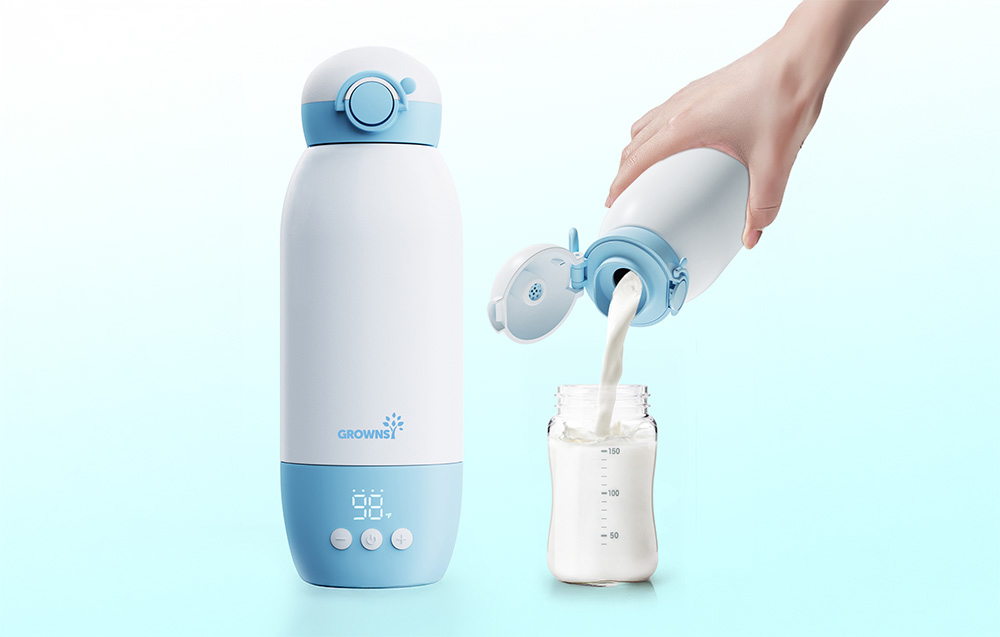 A hand pours milk from a portable bottle warmer into a bottle, with a second device standing next to it